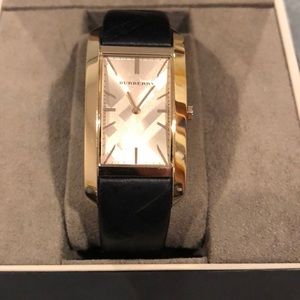 Black Burberry watch with gold hardware